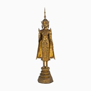 Escultura de buda de pie en bronce dorado y cincelado, década de 1700