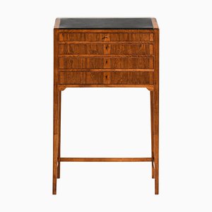 Mueble independiente de palisandro, latón y cuero atribuido a Frits Henningsen, años 50