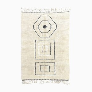 Tappeto in lana geometrica intrecciata a mano
