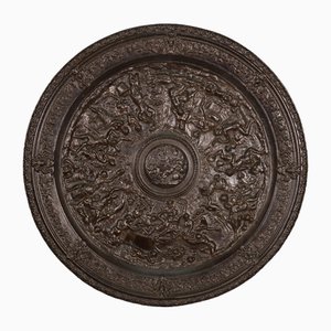 Piatto da parete in acciaio fuso con patina bronzea, XIX secolo