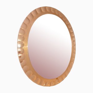 Espejo ovalado biselado en oro rosa de Cristal Art, años 60
