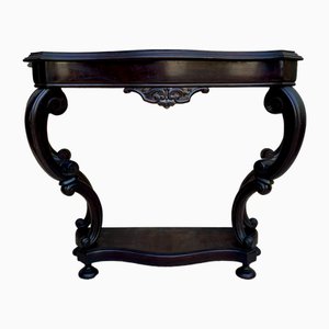 Consola francesa Regency de nogal tallado