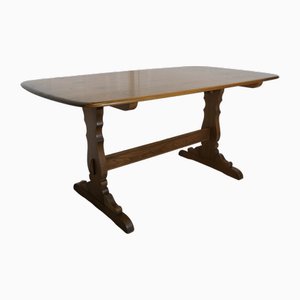 Golden Elm Refectory Dining Table from Ercol, 1960s