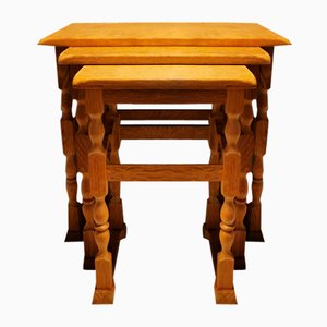 Nesting Tables in Oak with Carvings attributed to Henry Kjærnulf for Nyrup Furniture Factory, Denmark, 1960s, Set of 3