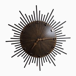 Vintage Wall Clock Sunburst with Brown Dial and Black Metal Rays from Luxus, 1970s