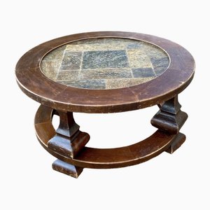 Mesa de centro redonda de piedra y madera, años 80