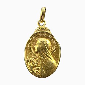 Charm St Therese francés Becker en oro amarillo de 18 k, década de 1890