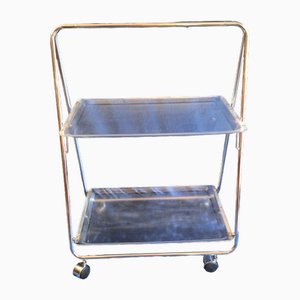 Carrito de té vintage plegable con estructura de metal cromado y estantes de acrílico, años 70
