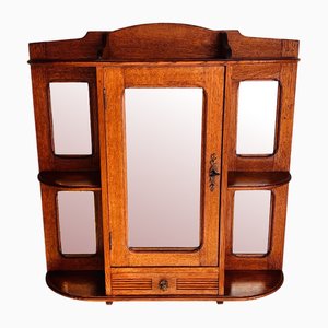 Mobiletto vintage in legno con specchi in cristallo molato