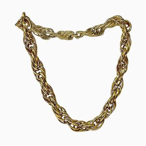 Collar triple trenzado bañado en oro de Nina Ricci, años 80