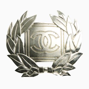 Broche vintage de metal plateado de Chanel