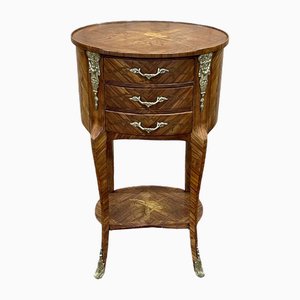 Mesa auxiliar Luis XV con tres cajones de palisandro y roble, años 70