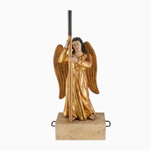 Aus vergoldetem Holz geschnitztem und polychrom bemaltem Engel Kerzenständer, 19. Jh.