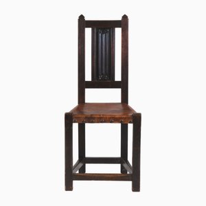 Silla auxiliar Arts & Crafts de roble y cuero, década de 1890
