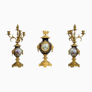 Reloj tríptico francés Napoleón III antiguo de bronce dorado y porcelana de Sevres. Juego de 3