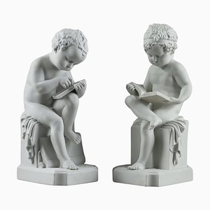Biskuitporzellanfiguren mit lesendem Kind und Zeichnung des Kindes, 1900er, 2er Set