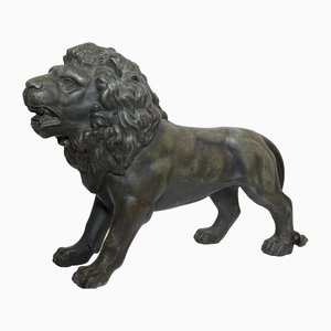 Escultura de león victoriana pequeña en bronce