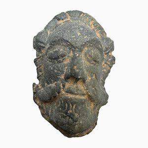 Placa con el rostro dormido de un caballero isabelino, siglo XVI