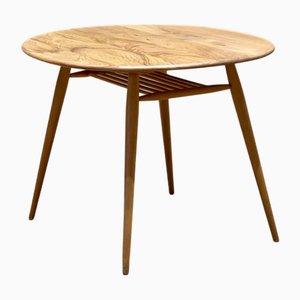 Vintage Round Dining Table with Rack by Lucian Ercolani for Ercol, 1960s