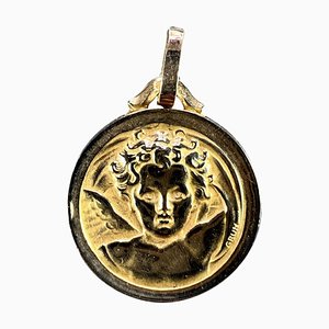 Colgante con medalla de querubines Raphaels francés de oro amarillo de 18 kt de Sam Grün, años 30