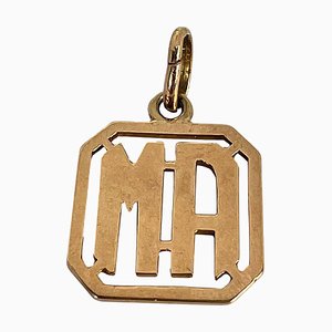 Colgante de oro amarillo de 18 kt con monograma MA o AM, años 40