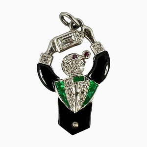 Colgante Art Déco de platino con diamantes y ónice esmeralda y rubí, años 20