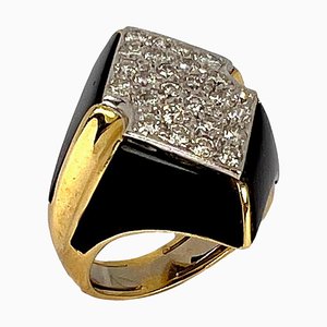 Anillo de cóctel de oro amarillo de 18 kt con diamantes de ónice, años 80