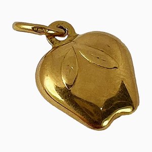 Colgante con forma de fruta en oro amarillo de 18 k, años 70