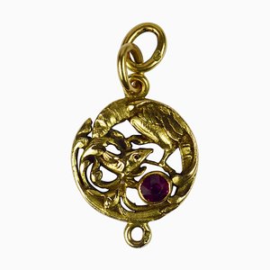 Colgante de grifo francés modernista en oro amarillo de 18 kt con rubíes rojos, década de 1890