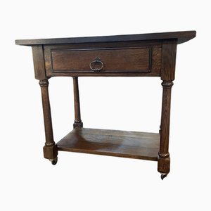 Mesa auxiliar antigua con ruedas