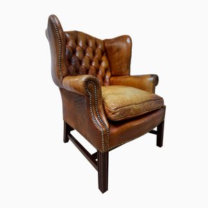 Cognacfarbener Mid-Century Chesterfield Ohrensessel aus Leder, 1960er