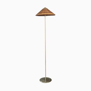 Floor Lamp in Brass and Rattan in the style of Paavo Tynell, Italy, 1960s