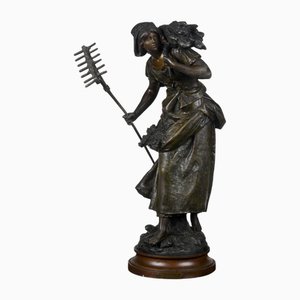 Escultura de metal de Auguste Moreau Faneuse