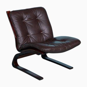 Poltrona vintage in pelle e compensato, anni '60