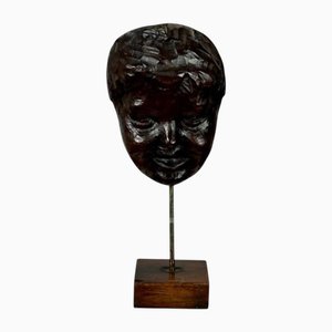 Male Face Sculpture on Stand