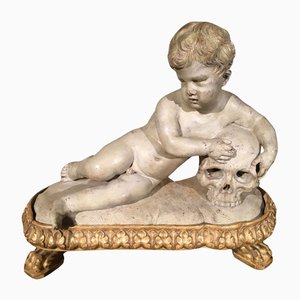 Escultura con figura de calavera infantil Memento Mori, mármol blanco de imitación, finales del siglo XVII
