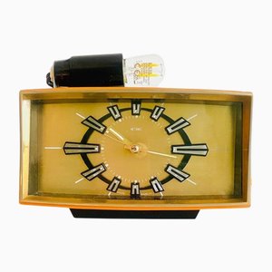 Mid-Century Alarm Clock Orange Gold with Light from Metamec, 1950s