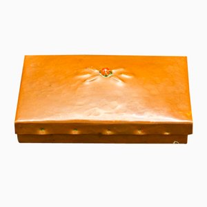 Tabaquera Amsterdam School de cobre con acento de cornalina, de principios del siglo XX