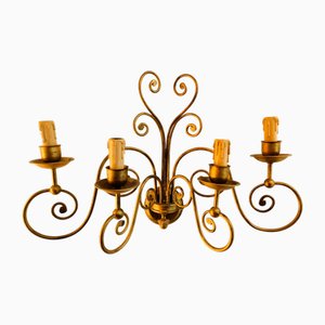 Aplique de pared de hierro forjado con cuatro luces