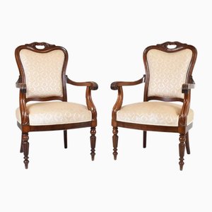 Set aus antiken offenen Sesseln