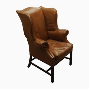19th Century Tan Leather Wingback Armchair with Out-Scrolled Arms & Brass Stud Detailing, 1800s