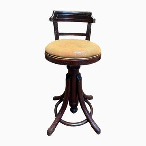 Adjustable and Rotating Work Stool from Baumann