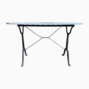 Mesa bistró de mármol y hierro fundido