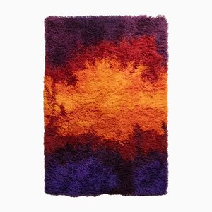 Alfombra arcoíris en azul era espacial, años 70