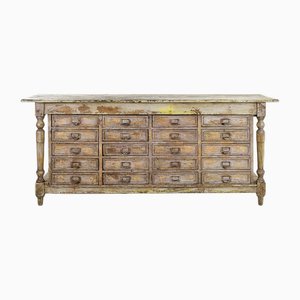Buffet in legno massello patinato con 20 cassetti
