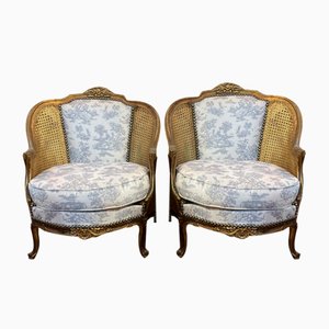 Französische Vintage Bergere Stühle aus vergoldetem Holz, 2er Set