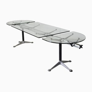 Mesa de reuniones extensible llamada Burdick Group System Table de acero y aluminio con superficie de vidrio de Bruce Burdick para Herman Miller, años 80