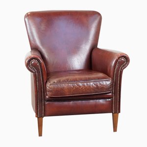 Armchair with Proper Finish and Decorative Nails