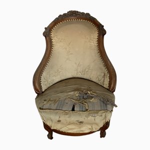 Butaca victoriana de nogal para mujer