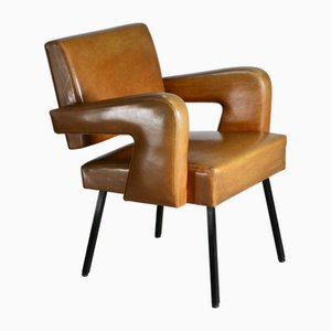 Butaca atribuida a Jacques Adnet, 1955